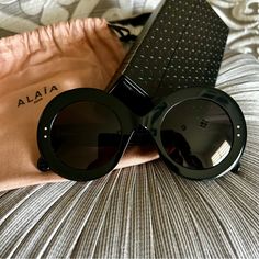 100% Authentic Alaa, Azzedine Series, Round Black Sunglasses, Brand New Condition, Never Been Worn. They Come With Case, Cleaning Cloth And Dustbag. Retail Price $610. Width: 50 Mm. Lens Bridge: 26 Mm. Arm Length: 145 Mm. 100% Uv Protection. Elegant Black Round Sunglasses, Novelty Sunglasses, Azzedine Alaia, Nike Air Max Tn, Sunglasses Brand, Black Sunglasses, Colored Sunglasses, Cleaning Cloth, Cat Eye Sunglasses