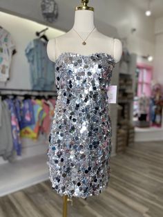 "Shine on and stand out in this Else strapless mini dress. With a dazzling sequin design, this dress is perfect for any party. Go ahead, make a statement and have some fun!" Dress Silver, Sequin Design, Strapless Mini Dress, Sequin Mini, Silver Dress, Shine On, Sequin Mini Dress, Go Ahead, Turks And Caicos Islands