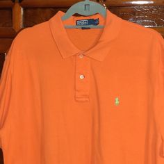 Authentic, custom fit, orange, Ralph Lauren, polo shirt. Size: men's large/ women's xl. Classic Orange Collared Top, Casual Orange Collared T-shirt, Orange Collared Cotton Polo Shirt, Orange Cotton Short Sleeve Polo Shirt, Orange Cotton Collared Polo Shirt, Reading Pa, Ralph Lauren Polo Shirt, Ralph Lauren Polo, May 21