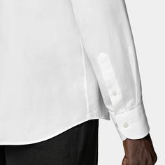 On its own or paired with a jacket, this casually refined white shirt is tailored slim with large point collar, and neat french placket, and a subtly curved hemline that's perfect for wearing untucked. Classic Fitted Shirt With Welt Pockets, Elegant Shirt With Welt Pockets For Office, Modern Tailored Tops With Spread Collar, Classic Dress Shirt With Welt Pockets For Work, Modern Shirt With Lapel Collar For Office, White Collared Business Shirt, Modern Semi-formal Shirt With Button Cuffs, Formal Tops With Welt Pockets And Spread Collar, Classic Formal Shirt With Welt Pockets