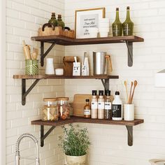 the shelves in the bathroom are filled with various items