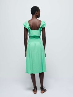 The tiered ruffle straps and smocked waistline make this the must-have midi dress of the season. Go ahead. Show off a little. (This one comes in Katydid.) | Women's Brittini Midi Dress in Katydid | Ethical Essentials Chic Midi Dress With Smocked Bodice And Ruffled Straps, Casual Midi Dress With Smocked Back And Ruffled Straps, Flowy Ruffled Midi Dress For Daywear, Sundress With Smocked Back And Tiered Skirt, Ruched Tiered Skirt Midi Dress For Daywear, Flowy Midi Dress With Ruffles For Daywear, Spring Midi Dress With Smocked Bodice And Ruffled Straps, Green Smocked Midi Dress With Ruffle Hem, Ruched Smocked Dress With Ruffled Straps For Daywear