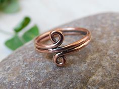 Solid Copper spiral ring for Mom, dainty ring for Gift, copper boho ring for parents, arthritis wrap ring for healing joint pain Jewelry, All my Designs are original. Size - All Ring Size This Ring is for Women Occasion:- Anniversary Gift, Birthday Gift, Wedding Gift, Gift Pendant, Valentine's Gift, Engagement Gift, New Year Gift, Christmas Gift, Other Occasion & Parties, etc. *  Gifts for Boyfriend *  Gifts for Dad*  Gifts for Girlfriend*  Gifts for Husband*  Gifts for Mom*  Gifts for Sister*  Gifts for Wife*  Anniversary Gifts*  Birthday Gifts*  Christmas Gifts*  Gifts for Her*  Gifts for Him*  Housewarming Gifts*  Personalized Gifts*  Gifts Your order will be handmade and ready for shipment in 1-3 business days. Normally we ship through USPS which takes a maximum of 2 to 3 weeks if you Ring For Mom, For Boyfriend Gifts, Husband Gifts, Spiral Ring, Friendship Rings, Zierlicher Ring, Copper Ring, Wrap Ring, Dad Gifts