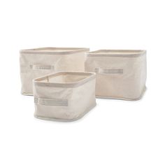 three canvas storage bins with handles on each side