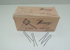 "Remember the spit curls, girls?????? When nothing other than our hair pins would do? Now you can have your own box of pins and bring back the spit curl days. Here we have a box of Flamingo 1 ¾\" invisible black crimped hair pins. The pins box is marked \"Made in France\". The box is marked 1 lb, but has been opened and some pins, not many, have been used and the box is almost full. The box has some wear but overall, it is in good condition. The clips are 1 ¾' long and the box is 5\" x 2 3/8\" x Black Crimped Hair, Spit Curls, Girls When, Pin Box, Crimped Hair, Candle Wall Sconces, Honeycomb Pattern, Vintage Bathroom, Business Thank You