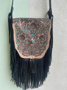 genuine leather   black  31 cm  x 31 cm  actual bag size  fringe  30 cm   adjustable shoulder strap  fully lined with an inside pocket  out pocket on the back   amazing workmanship  floral - sunflower design   can be made in other colours  upon request Black Fringe Purse, Black Hand Tooled Tote Shoulder Bag, Black Hand Tooled Tote Bag, Black Bohemian Bag With Fringe, Black Fringed Shoulder Bag For Festival, Black Fringe Shoulder Bag For Festival, Leather Sunflower, Fringe Purse, Fringe Bags