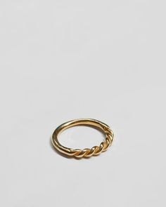 This soft and sumptuous gold ring was formed by twisting two strands of pliable sculpting wax to and then molding the braid in to a perfect, organic band that you'll never want to take off.  Lovely alone or great in a stack.  Available in 10k or 14k gold, each piece is individually sculpted by hand in our studio and ca Modern Twist Twisted Promise Ring, Modern Twisted Shape Promise Ring, Modern Twisted Promise Ring, Yellow Gold Twisted Stackable Jewelry, Modern Twist 14k Gold Twisted Ring, Adjustable Twisted 14k Gold Rings, Adjustable 14k Gold Twisted Ring, Twisted 14k Gold Rings With Modern Twist, Modern Twist Yellow Gold Twisted Stackable Rings