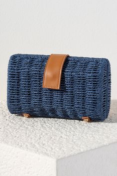 Add a classic touch to your outfit this summer with Shiraleah's Augustine Clutch. The sturdy paper straw base makes a classic clutch to carry, while the detachable cross-body chain adds versatility to your style. Available in three classic colors, this bag is perfect for any occasion. Pair with other items from Shiraleah's American Summer collection to complete your look! American Summer, Paper Straws, Lifestyle Brand, Lifestyle Brands, Little Gifts, Summer Collection, Gold Hardware, Snap Closure, This Summer