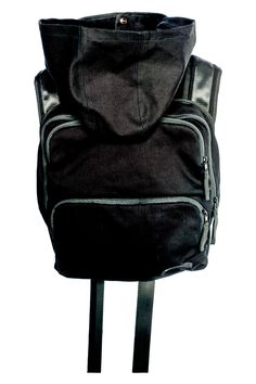 Blackout Backpack Tech Wear Essential with Hide A Way Hood As part of the ongoing resistance, we strive to bring light to the shadows and power to the people, so we are offering up an essential, all black backpack utilitarian masterpiece. Multifunctional, the Blackout Backpack hits you with the one, two, three combo of function, form, and fashion. Featuring an adjustable cowl neck with a secret hide a way hood inside, this piece also ranks high on comfort with foam lined shoulder straps and a fr Black Multifunctional Backpack For Outdoor, Functional Black Anti-theft Backpack, Multifunctional Black Backpack For Outdoor, Black Techwear Backpack For Travel, Black Hiking Bags With Multiple Pockets, Modern Black Backpack With Functional Pockets, Practical Black Backpack, Black Practical Backpack With Zipper Pocket, Modern Black Backpack With Anti-theft Pocket