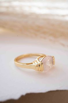 D E T A I L S — METAL: Gold Plated 18k: Gold plated jewelry has a layer of gold covering a base metal. — Stone: Rose Quartz. 💎 The gemstone is The Rose Quartz. ✦Rose Quartz, the crystal of Unconditional Love, it's considered a stone of the heart. It carries a soft feminine energy of compassion and peace, nourishment and comfort. 💎 The natural gemstone can vary in color, shape or size. BACK SIDE OF THE RING: The metal band of our rings is never completely covering the gem from the back side, so Gold Crystal Ring With Gemstone In 14k Gold, Gold Faceted Open Ring Jewelry, 14k Gold Crystal Ring With Gemstone, Faceted Gold Open Ring Jewelry, Gold Plated Gemstone Crystal Ring, Gold-plated Gemstone Crystal Ring, Gold-plated Crystal Ring With Gemstone, Gold Faceted Open Ring, Gold Crystal Ring With Gemstone In Fine Jewelry Style