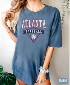 Atlanta  Baseball T Shirt, Atlanta Comfort Colors, Oversized Vintage Style Tee We use ultra-premium Comfort Color garment dyed tees - perfect for giving you a relaxed stylish look. You will love these tees! You can choose from a rich color palette that's as varied as nature itself. If you have any concern about product/design/colors, etc., please do not hesitate to contact us. Choose your t-shirt's color and size on the drop-down menu to the right. You can scroll through the photos to see the size chart and color swatches. ►FEATURES ABOUT THE GARMENT; Super soft, fade resistant, water based, vibrant, direct to garment printing Heavyweight 100% Ring Spun US Cotton Our garments are pre-shrunk during the garment dye and wash processes for almost no shrinkage at home. Garment-dyed ring spun fa Sporty Washed T-shirt With Relaxed Fit, Athleisure T-shirt With Letter Print, Sporty Acid Wash T-shirt For Spring, Sporty Acid Wash Soft-washed T-shirt, Sporty Soft-washed T-shirt For Loungewear, Soft-washed Relaxed Fit T-shirt For Athleisure, Faded Sporty Top, Faded Washed Sporty Top, Sporty Acid Wash Soft-washed Tops