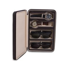 Your favorite accessories deserve nothing less than luxury when you travel. Crafted from beautiful leather with contrast stitching and scratch-resistant velour lining to keep your watches and glasses safe and smudge-free. A thoughtful gift for the frequent traveler, add a classic monogram for a personal touch.    11.25"l x 7.25"w 2.25"h  Genuine leather with soft, scratch-resistant velour lining.  Fits 2 watches and 2 pairs of glasses.  Wipe with a soft dry cloth.  Imported.  Monogramming is las Watch Safes, Personalized Sunglasses, Eyeglass Case, Glasses Case, Gift Accessories, Watch Case, Prescription Glasses, Monogram Initials, Travel Case