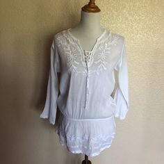 Lrl Lauren Jeans Co. Ralph Lauren Embroidered Gauze Drop Waist Top M White Excellent Condition Washed But Never Been Worn Size Medium Excellent Condition Like New Washed, Never Worn Elastic Drop Waist White Color Gauze Embroidered Front, Neck, And Hem Ties On Front, Lace Up Long Sleeve Boho Bohemian Size On Tag Says 2x But Top Is Really A Size M Bust Across - 21 Inches Length - 28 Inches Pet-Free Smoke-Free Home Ships Same Day Or Next Day Experienced Seller I070(Pmd) Summer Embroidered Long Sleeve Top With Lace Trim, Summer Long Sleeve Embroidered Top With Lace Trim, Casual Long Sleeve Embroidered Beach Top, Casual Long Sleeve Embroidered Top For Beach, Long Sleeve Floral Embroidered Top For Beach, Vacation Long Sleeve Top With Chikankari Embroidery, Summer Beach Embroidered Top With Lace Trim, Embroidered Long Sleeve Summer Tops, Summer Embroidered Long Sleeve Tops