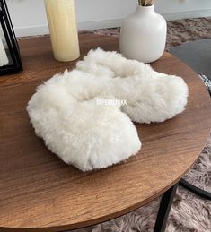 Alpaca fur slippers - alpaca slippers from Peru - unisex slippers - fur slippers - winter slippers - Gift for any occasion The unisex Luxurious Alpaca Fur Slippers keep your feet nice and cozy even on the most blustery winter's eve. These fur slippers are very well made, ensuring they will last for years. These baby alpaca slippers are made from the finest Alpaca fur and are guaraunteed to keep ones feet warm this winter. Material: Alpaca outer, sheepskin wool lines the inside, bottom suede Bene Cozy Faux Fur Slippers With Round Toe, Winter Faux Fur Slippers With Scuffs, Winter Slippers With Plush Lining And Faux Fur, Fluffy Slip-on Cozy Slippers, Fluffy Slip-on Slippers For Indoor Use, Cozy White Slippers With Plush Lining, Cozy Fluffy Slip-on Slippers, Fluffy Slip-on Indoor Slippers, Winter Faux Fur Slip-on Slippers