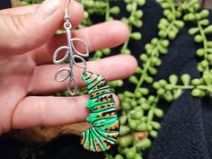 These vibrant green caterpillars are unique and interesting. Made just for all the other extreme nature lovers out there! Handmade Green Whimsical Earrings, Unique Green Pierced Earrings, Unique Green Dangle Earrings, Artsy Green Earrings With Ear Wire, Artsy Green Drop Earrings, Green Artsy Drop Earrings, Artsy Green Earrings For Gift, Whimsical Green Jewelry, Artsy Green Earrings