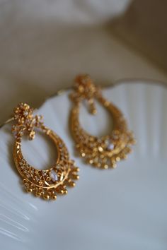 Festive earrings Luxury Gold Plated Fusion Earrings, Luxury Earrings For Diwali Celebration, Ear Rings In Temple Jewelery, Luxury Handmade Jewelry For Diwali, Luxury Traditional Jhumkas For Festivals, Luxury Chandbalis With Tilla For Festivals, Luxury Handmade Earrings For Diwali, Luxury Chandbalis With Intricate Design, Luxury Dangle Chandbalis For Festivals