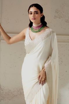 Ivory silk satin saree with woven gota edging. Paired with a hand embroidered blouse. - Aza Fashions Wedding Raw Silk Pre-draped Saree With Border, Wedding Chanderi Blouse Piece With Border, White Raw Silk Blouse Piece For Reception, Elegant White Art Silk Pre-draped Saree, Elegant White Pre-draped Saree In Art Silk, Elegant Traditional Wear With Border For Wedding, Elegant Silk Traditional Wear With Border, White Silk Pre-draped Saree For Festive Occasions, White Raw Silk Saree With Unstitched Blouse