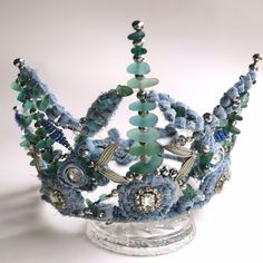 Glorious mermaid crown LISA. A unique denim crown handcrafted by me. Made in Latvia with love.  The contrast of denim roughness, shimmery glass beads and natural sea glass is a stunning and contemporary combination. The crown will compliment and enhance any your festival outfit look.  It is adjustable and ties on its back, so it will fit to any size of head. The crown is set on solid base. All components and beads are  tightened together with wires. You can use it in any weather conditions and not to be  worried something will fall or peel off. If needed, the crown can be gently washed with soft brush and soap. You will receive LISA beautifully boxed and wrapped. Glass Crown, Mermaid Crown, Hag Stones, Magic Stones, Mermaid Dreams, Latvia, Festival Outfit, Wedding Hair Accessories, The Crown