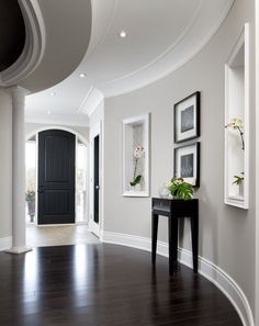 the hallway is clean and ready for us to use as an entrance way in this house