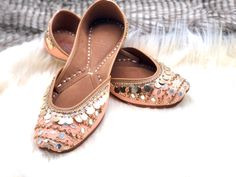 Ethnic Indian/Pakistani style shoes durable, hand stitched with genuine leather sole and leather padded cushion inside. Cute peachy vibes with a tinge of rose gold color. Flattering for all outfits, pairs well with lots of outfits. Buy for yourself or gift a friend these adorable cute fun shoes. Sizes available US 6,7,8,9,10.Shipped from USA Indian Sandals, Silver Ballet Flats, Indian Shoes, Womens Costume, Gold Ballet Flats, Bridal Flats, Wedding Shoes Flats, Sandals Flats, Costume Shoes