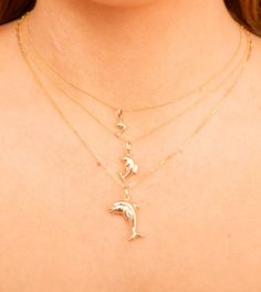 This 14k gold dolphin charm necklace is a beautiful way to show off your style. Crafted from 14k yellow gold, the pendant necklace is sure to be a charming addition to any jewelry collection. Dolphin Charm, Dolphin Necklace, Paper Clip, Dolphins, Charm Pendant, Charm Necklace, Your Style, Jewelry Collection, Yellow Gold