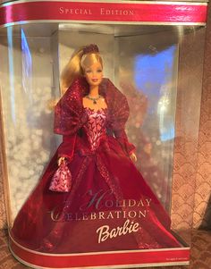 the barbie holiday celebration barbie doll is in its box