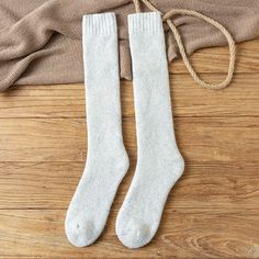 These 3 Pairs Of Soft Warm Wool Socks are perfect for keeping your feet cozy during the colder months. With a middle tube height and a thick material composition of cotton, polyester, wool, and spandex, these socks provide both warmth and durability. The socks also provide sweat absorption and prevent friction, making them comfortable to wear all day. Specification: Socks Tube Height: Middle Tube Material: Cotton, Polyester, Wool, Spandex Pieces: 6Pcs Thickness: Thick (Winter) Item Type: Sock Ge Casual Warm Knee-high Socks, Knee-high Socks For Winter Stocking Stuffer, Cozy Warm Solid Color Socks, Soft Solid Winter Socks, Winter Soft Solid Color Socks, Casual Thick White Socks, White Thick Casual Socks, Warm Knee-high Socks For Winter Stocking Stuffer, Super Soft Solid Winter Socks