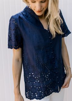 Model wearing a navy button up top with eyelet detail and scalloped short sleeves and hem. V-neck Tops With Buttons For Loungewear, Chic Navy V-neck Top, Starlit Night, Night Tops, Knee Skirts, 60 Fashion, Cute Comfy, Chic Look, Tunic Sweater