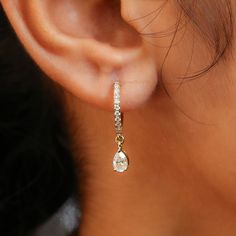 Pear Moissanite Dangle & Drop Earrings/Tear Drop Huggies Earrings/Helix Hoop Earrings/14K Gold Wedding Earrings/Latch Back Style Earrings/ ✥ 𝐖𝐞𝐥𝐜𝐨𝐦𝐞 𝐭𝐨 𝐀𝐝𝐨𝐫𝐧𝐉𝐞𝐰𝐞𝐥𝐥𝐞𝐫𝐲𝐈𝐍: 𝐔𝐧𝐯𝐞𝐢𝐥 𝐭𝐡𝐞 𝐁𝐞𝐚𝐮𝐭𝐲 𝐨𝐟 𝐆𝐨𝐥𝐝 & 𝐌𝐨𝐢𝐬𝐬𝐚𝐧𝐢𝐭𝐞 𝐃𝐢𝐚𝐦𝐨𝐧𝐝 𝐉𝐞𝐰𝐞𝐥𝐫𝐲! ✥ ↣ 𝐌𝐚𝐭𝐞𝐫𝐢𝐚𝐥𝐬: 925 Sterling Silver, Gold, Rose Gold, White Gold ✥ 𝐌𝐨𝐢𝐬𝐬𝐚𝐧𝐢𝐭𝐞 𝐃𝐢𝐚𝐦𝐨𝐧𝐝 𝐒𝐩𝐞𝐜𝐢𝐟𝐢𝐜𝐚𝐭𝐢𝐨𝐧𝐬: ↣ 𝐒𝐡𝐚𝐩𝐞: Round Cut & Pear Cut  ↣ 𝐃𝐢𝐦𝐞𝐧𝐬𝐢𝐨𝐧: 1.50 MM & 6x4 MM  ↣ 𝐂𝐚𝐫𝐚𝐭 𝐖𝐞𝐢𝐠𝐡𝐭: 0.41 CTW (approx.) ↣ 𝐂𝐥𝐚𝐫𝐢𝐭𝐲: VVS ↣ 𝐂𝐨𝐥𝐨𝐫: Colorless ✥ 𝐖𝐡𝐲 𝐂𝐡𝐨𝐨𝐬𝐞 𝐌𝐨𝐢𝐬𝐬𝐚𝐧𝐢𝐭𝐞 𝐃𝐢𝐚𝐦𝐨𝐧𝐝: ↣ 𝐀𝐟𝐟𝐨𝐫𝐝𝐚𝐛𝐥𝐞 𝐋𝐮𝐱𝐮𝐫𝐲: Get fancy stuff without spending too much. ↣ 𝐆𝐨𝐨𝐝 𝐌𝐚𝐭𝐞𝐫𝐢𝐚𝐥𝐬: We use gems that don't ca Luxury White Gold Huggie Dangle Earrings, Single Teardrop Diamond Earring For Wedding, Teardrop Diamond Single Earring For Wedding, Wedding Teardrop Diamond Single Earring, Fine Jewelry Teardrop Huggie Earrings For Anniversary, Fine Jewelry Teardrop Hoop Earrings For Anniversary, Teardrop Huggie Earrings Fine Jewelry For Anniversary, Teardrop Huggie Earrings For Anniversary, Teardrop Hoop Earrings For Anniversary In Fine Jewelry Style