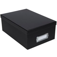 a black box with a white label on the front and bottom, is shown against a white background