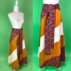 SHIPPING DELAY All orders placed after Dec. 19th will not ship out until Jan. 3rd Boho it up this fall in this beautiful patchwork peddler skirt from Chessa Davis! Diagonal panels of rich golden velvet, a vibrant kente cloth inspired woven fabric, and ivory lace are finished off with a comfy elastic waist and wide sash. * 1970s * label: Chessa Davis * size marked: none, fits like a modern M/L (please see measurements) * materials: velvet, woven, lace * fully lined * elastic waist * matching wais Bohemian Flared Patchwork Skirt, Bohemian Tiered Skirt With Patchwork, Bohemian Tiered Skirt Bottoms With Patchwork, Bohemian Multicolor Flared Wrap Skirt, Bohemian Multicolor Asymmetrical Skirt, Hippie Patchwork Tiered Skirt, Hippie Patchwork Maxi Skirt, Bohemian Asymmetrical Multicolor Maxi Skirt, Bohemian Multicolor Asymmetrical Maxi Skirt