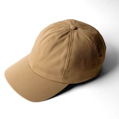 Six panel with precurved visor and adjustable back strap. Shell: 100% Cotton Twill Lining: 70% Polyester, 30% Cotton Made in Canada Washing Instructions: Hand wash cold, lay flat to dry Beige Baseball Cap For Outdoor Activities, Functional Hats With Adjustable Fit And Curved Brim, Classic Solid Baseball Cap For Everyday, Classic Solid Color Baseball Cap For Everyday, Brown Curved Visor Hat For Outdoor, Brown Hat With Curved Visor For Outdoor, Casual Solid 5-panel Baseball Cap, Classic Everyday Solid Baseball Cap, Classic Beige Six-panel Baseball Cap