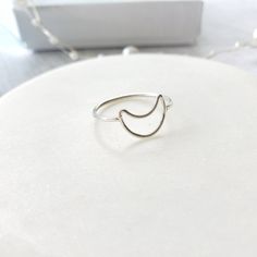 Cute crescent moon ring handmade in 925 sterling silver. This ring is perfect to wear alone or with a stackable ring. It is also beautiful as a midi ring. Beautiful gift for a special day. Gift for girls, for mom, for daughter, wife, grandmother, friend, girlfriend or an important person. It is ideal gift for birthday, anniversary, mother's day, Christmas, bridesmaid. ♥ Item Details: Metal type: Sterling silver Karat / purity: 925. Moon dimensions: 8.8 x 11.8mm The ring is 100% handmade. Each ri Minimalist Open Ring With Moon Charm, Minimalist Moon Charm Open Ring, Minimalist Crescent Moon Charm Ring, Minimalist Moon Phase Open Ring Jewelry, Minimalist Adjustable Rings With Moon Charm, Minimalist Adjustable Ring With Moon Charm, Minimalist Rings With Moon Charm For Gifts, Minimalist Moon Charm Rings For Gifts, Minimalist Moon Charm Rings As Gift