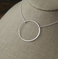 Extra large 36mm circle necklace in sterling silver, silver circle, large silver circle, eternity necklace, infinity necklace, valentine day A round sterling silver circle is attached to a sterling silver chain that can be any length up to 22 inches and then secured with a sterling silver spring clasp. The circle is made of round wire and the other part is flattened wire and measures 36mm in diameter. Your purchase will arrive in a jewelry box ready for gift giving or as a gift for yourself! Ent Minimalist Sterling Silver Round Disc Jewelry, Minimalist Sterling Silver Disc Jewelry, Sterling Silver Full Circle Necklace For Everyday, Minimalist Sterling Silver Open Circle Necklace, Silver Full Circle Jewelry For Everyday, Nickel-free Sterling Silver Circle Necklaces, Circle Sterling Silver Necklace In White Gold, Minimalist Sterling Silver Circular Jewelry, Minimalist Sterling Silver Circle Jewelry