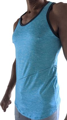 Yes -- we're calling this the "perfect" tank & you'll want it in EVERY COLOR! This Tank is what we've been striving for! And it comes in multiple colors! Some of them very unique and fun like Coral & Lavendar! Form-fitting contour yet a great drape through the torso.Cool-Factors are in the details! ❤❤~ fun diagonal cover stitch across the front & back~ slightly curved, bell-shape bottom~ relaxed neckline in 2x1 rib fabric~ 3" longer body than the average Tank for greater coverage!NEW Blue Stretch Sports Vest, Stretch Tank Top For Training, Stretch Tank Vest For Athleisure, Blue Sleeveless Tank Top For Gym, Casual Racerback Tank Top With 4-way Stretch, Fitted Tank Vest For Training, Fitted Functional Tank Vest, Crew Neck Workout Tank Top, Functional Fitted Tank Vest