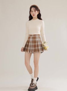 Pleated mini tennis skirt in our toasted plaid pattern. Concealed side zipper. Lined with safety shorts. S: 25" waist, 14.5" lengthM: 26.5" waist, 14.5" lengthL: 28" waist, 15" lengthXL: 29.5" waist, 15" length Mini Tennis Skirt, Safety Shorts, Pleated Tennis Skirt, Casual Day Outfits, Overall Dress, Tennis Skirt, Sweater Blouse, Cardigan Jacket, Plaid Pattern