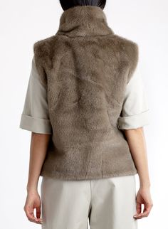 This style features: Loose turtleneck Sleeveless Boxy fit Side pockets Fabric content: 100% Polyester Dry clean only Loose Turtleneck, Turtleneck Sleeveless, Sleeveless Turtleneck, Dark Taupe, Fur Fashion, Fur Vest, Fall Shopping, Jumpsuit Dress, Topshop