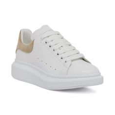 Crafted Of Italian Leather, Alexander Mcqueen's Oversized Sneakers Feature A Suede Back Panel And A Platform Rubber Sole. Stamped Logos At The Heel And Tongue Complete The Design. Round Toe Lace-Up Style Leather Upper Rubber Sole Made In Italy Size Rubber Platform, 1.75" (45mm) White Suede Platform Sneakers With Textured Sole, White Suede Round Toe Platform Sneakers, White Suede High-top Platform Sneakers, White High-top Suede Platform Sneakers, White Suede Platform Sneakers, Designer White Suede Sneakers, White Luxury Suede Sneakers, Luxury White Suede Sneakers, Alexander Mcqueen Oversized Sneaker