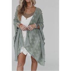 Elevate your wardrobe with the ultimate boho kimono! Designed in a lightweight, textured sage fabric and adorned with playful pom-pom details, this kimono effortlessly adds a touch of bohemian charm to any outfit. With an open front, poncho armhole sleeves, and side slits, it's the perfect combination of style and comfort. Embrace your free-spirited nature with the Bali Embroidered Kimono. Approximate measurements are as follows: OS: 45" x 31" One Size Fits Most *Due to lighting and differences in monitors, actual colors may vary slightly from what appears online. Sage Fabric, Open Front Poncho, Embroidered Kimono, Boho Kimono, Beach Inspired, Free Spirited, Free Spirit, Front Open, Fabric Care