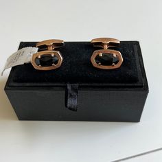 These Cuff Links In Gold And Onyx Are The Finishing Touch Every Suit Needs. Our Signature Kendra Scott Shape Pairs With Sleek, High-Polished Metals To Create An Elevated Accessory That’s Ready To Take Your Formal Looks To The Next Level. New With Tags. Never Worn In The Signature Velvet Box. Would Be A Great Gift. Stone Is 6/8" In Width Designer Cufflinks For Business, Classic Gold Cufflinks For Party, Designer Cuff Jewelry For Formal Occasions, Luxury Black Jewelry For Workwear, Designer Formal Cuff Jewelry, Elegant Adjustable Jewelry For Workwear, Elegant Adjustable Jewelry For Work, Classic Cuff Jewelry For Professional Use, Classic Office Cuff Jewelry