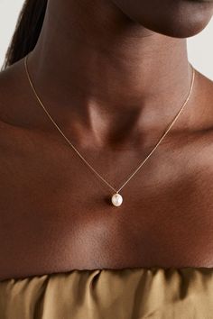 Understated and elegant, Mateo's necklace is the perfect accessory for so many outfits. It's handmade from 14-karat gold and strung with a single pearl that's illuminated by a tiny twinkling diamond. The delicate chain adjusts between three lengths, allowing you to find the ideal drop. Classic Single Strand Pearl Necklace In 14k Gold, Elegant 14k Gold Jewelry With Pearl Drop, Delicate Pearl Chain Necklace For Formal Occasions, Timeless Akoya Pearl Jewelry, Timeless Pearl Chain Necklace For Formal Occasions, Timeless Formal Pearl Chain Necklace, Classic Single Strand Pendant Jewelry, Classic 14k Gold Pearl Necklace, Refined Yellow Gold Pearl Necklace With Charm