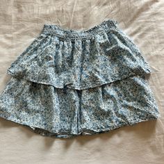 Nwot!! Super Cute Blue Floral Skirt For So Many Occasions!’ Blue Mini Skirt With Ruffles, Blue Ruffled Mini Skirt, Blue Ruffled Summer Skirt, Blue Ruffled Skirt For Summer, Blue High Waist Ruffled Skort, Blue High-waist Ruffles Skort, High-waist Blue Skort With Ruffles, High Waist Blue Ruffled Skort, Blue Tiered Summer Skirt