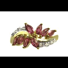 Hi, Here We Have A Beautiful 10k Yellow Gold Diamond And Genuine Pink Sapphire Ring With The Color Stone In A Marquise Shape And Round Cut Diamonds Surrounding It. The Total Weight Of Gold Is Approximately 2.8g. The Total Diamond Weight Is Approximately 0.05ct. This Is The Perfect Gift For Your Loved One. Comes With A Free Gift Box. Thanks For Looking And Have A Great Day. Style: Cocktail Sizable: Yes Metal: Yellow Gold Ring Size: 8.75 Metal Purity: 10k Formal Multi-stone Pink Ruby Ring, Formal Pink Multi-stone Ruby Ring, Pink Multi-stone Ruby Ring, Pink Sapphire Multi-stone Gold Jewelry, Pink Sapphire Ruby Ring With Multi-stone For Gift, Pink Multi-stone Ruby Ring As A Gift, Pink Multi-stone Sapphire Ring, Fine Jewelry, Pink Sapphire Multi-stone Jewelry For Gifts, Vintage Multi-stone Ruby Ring In 14k Gold