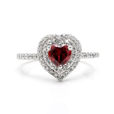 a heart shaped red and white diamond ring with diamonds around it on a white background