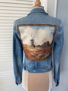 "Vintage distressed denim jacket, ft Claude Monet artwork. Hand-sewn art and up-cycled denim. A timeless classic! 16\" across 19\" length" Fitted Denim Jacket In Recycled Denim, Fitted Recycled Denim Jacket, Spring Recycled Denim Fitted Jacket, Spring Fitted Recycled Denim Jacket, Fitted Medium Wash Recycled Denim Jacket, Fitted Denim Jacket With Pockets In Recycled Denim, Fitted Recycled Denim Jacket With Pockets, Fitted Recycled Denim Outerwear With Pockets, Fitted Long Sleeve Denim Jacket In Recycled Denim