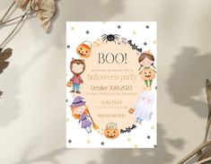 a halloween party with pumpkins, witches and boo on the front is featured in this card