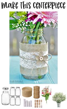 a mason jar filled with flowers on top of a blue table covered in burlock