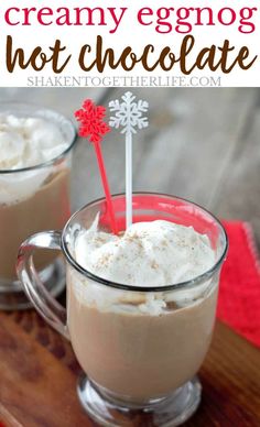 two glasses filled with hot chocolate and whipped cream