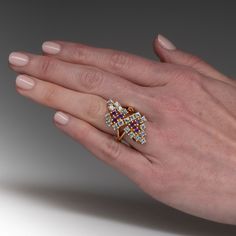 This gorgeous topaz and amethyst cocktail ring is accented with six (6), prong set, round modified brilliant cut natural amethyst and nineteen (19), prong set, round modified brilliant cut natural topaz. The ring measures 33.3mm at the top, rises 10.5mm above the finger, tapering to 3.3mm wide and 1.4mm thick at the base of the shank. It is currently a size 7.75. Elegant Multi-stone Cluster Birthstone Ring, Classic Diamond Multi-stone Amethyst Ring, Fine Jewelry Amethyst Diamond Multi-stone Ring, Fine Jewelry Amethyst Ring With Multi-stone Diamond, Fine Jewelry Amethyst Multi-stone Ring, Topaz Cocktail Ring, Amethyst Cocktail Ring, Cocktail Ring, Cocktail Rings