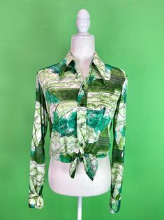 SHIPPING DELAY All orders placed after Dec. 19th will not ship out until Jan. 3rd Sprawling farm fields, barns, and silos on this fun green disco shirt! Technically a men's shirt, but who cares? * 1970s * label: Hutspah * size marked: medium, fits like a modern women's medium or men's small (please see measurements) * materials: nylon * front button up closure * approximate measurements (taken lying flat): bust - 19.5 in. length - 28 in. shoulders - 16 in. * condition notes: excellent vintage co Farm Fields, Farm Landscape, 70s Green, Green Farm, Disco Shirt, Disco Outfit, Button Up Top, Vintage 70s, Modern Woman